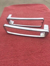 Load image into Gallery viewer, 1972-1975 Chevrolet LUV Pickup Truck NOS Turn Signal Park Light Bezel Rim Pair
